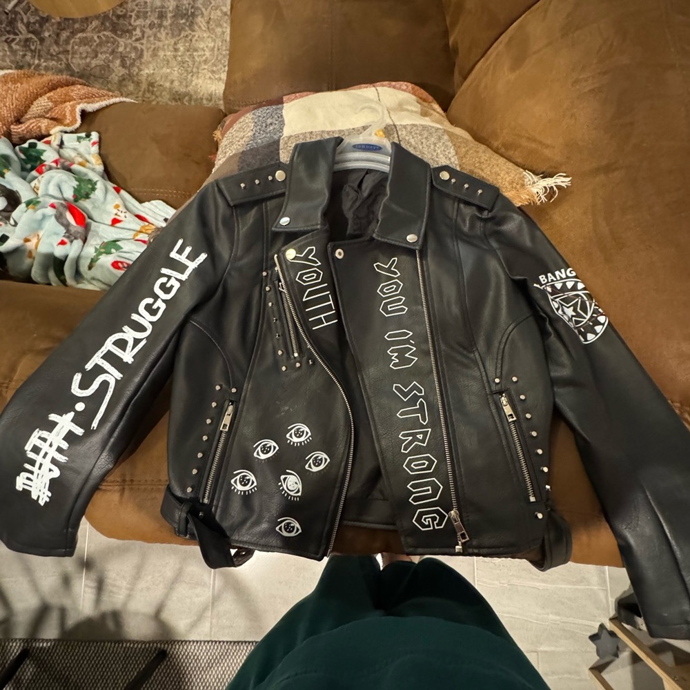 Sleek Black and White Leather Jacket with Unique Design